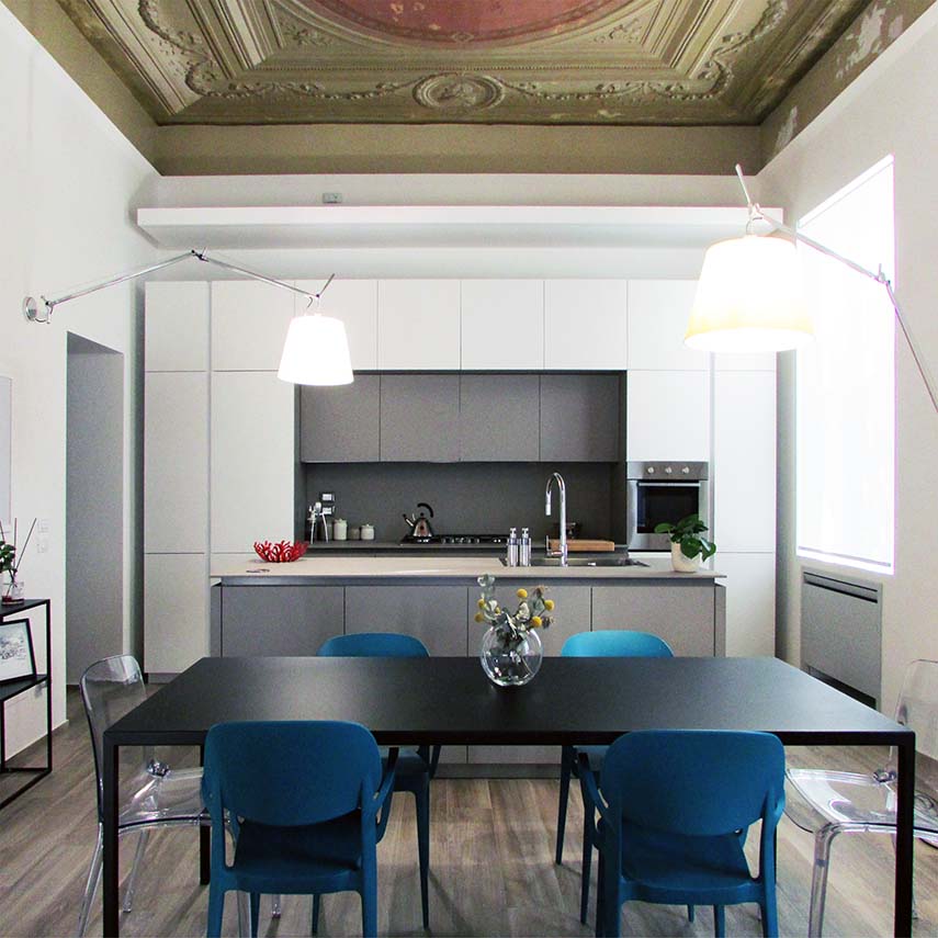 Recuperación del edificio en via Matteotti 189. Líneas puras y frescos