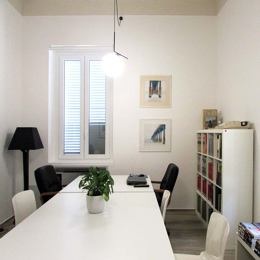 Recuperación del edificio en via Matteotti 189. Líneas puras y frescos