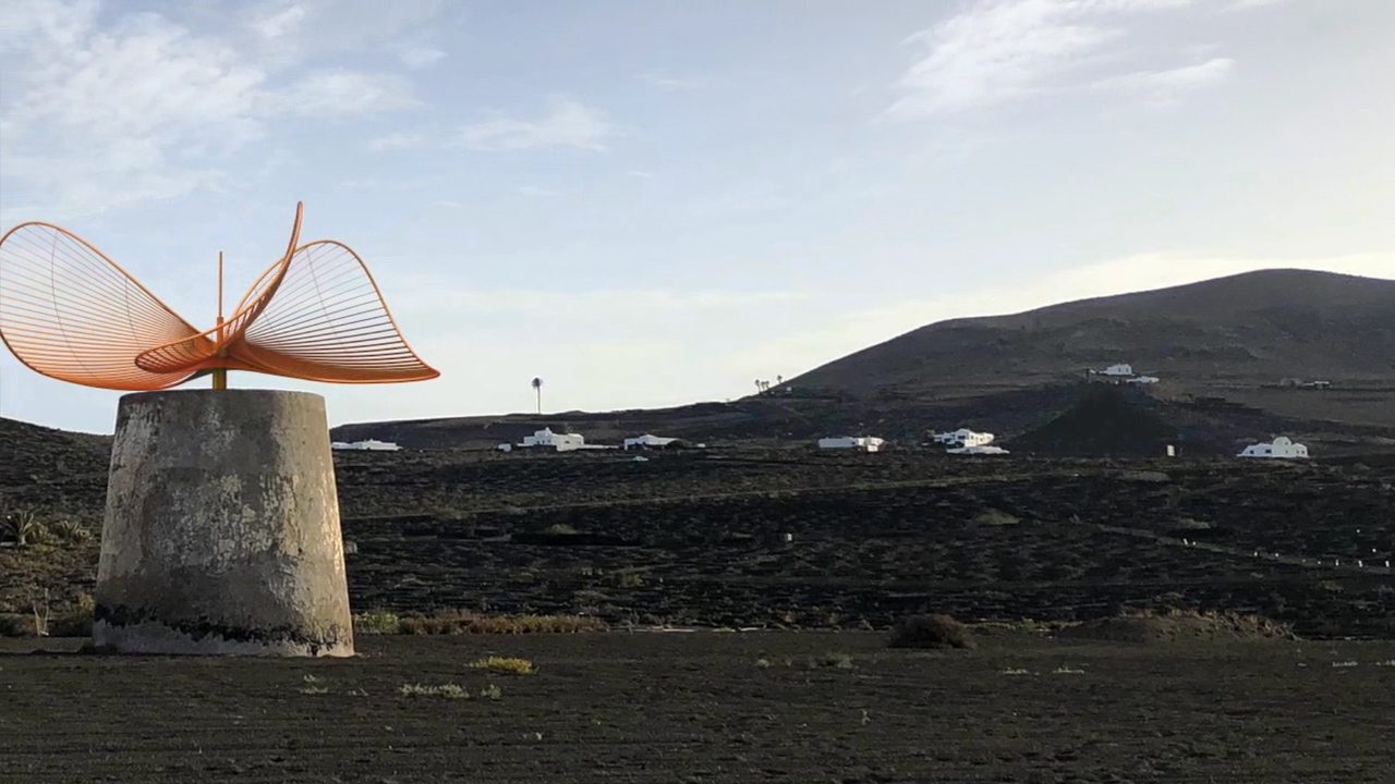 Among the volcanoes of Lanzarote, a windmill-turbine combination of poetry and technology