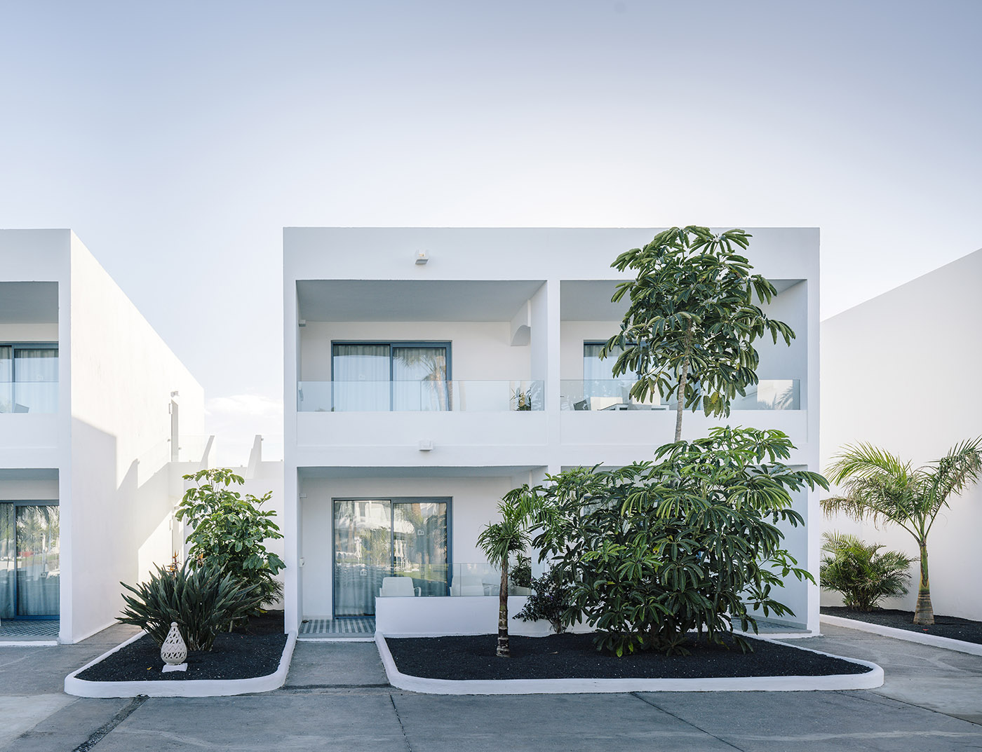 Delicate moodboard with splashes of blue. A small village styled hotel complex in Lanzarote
