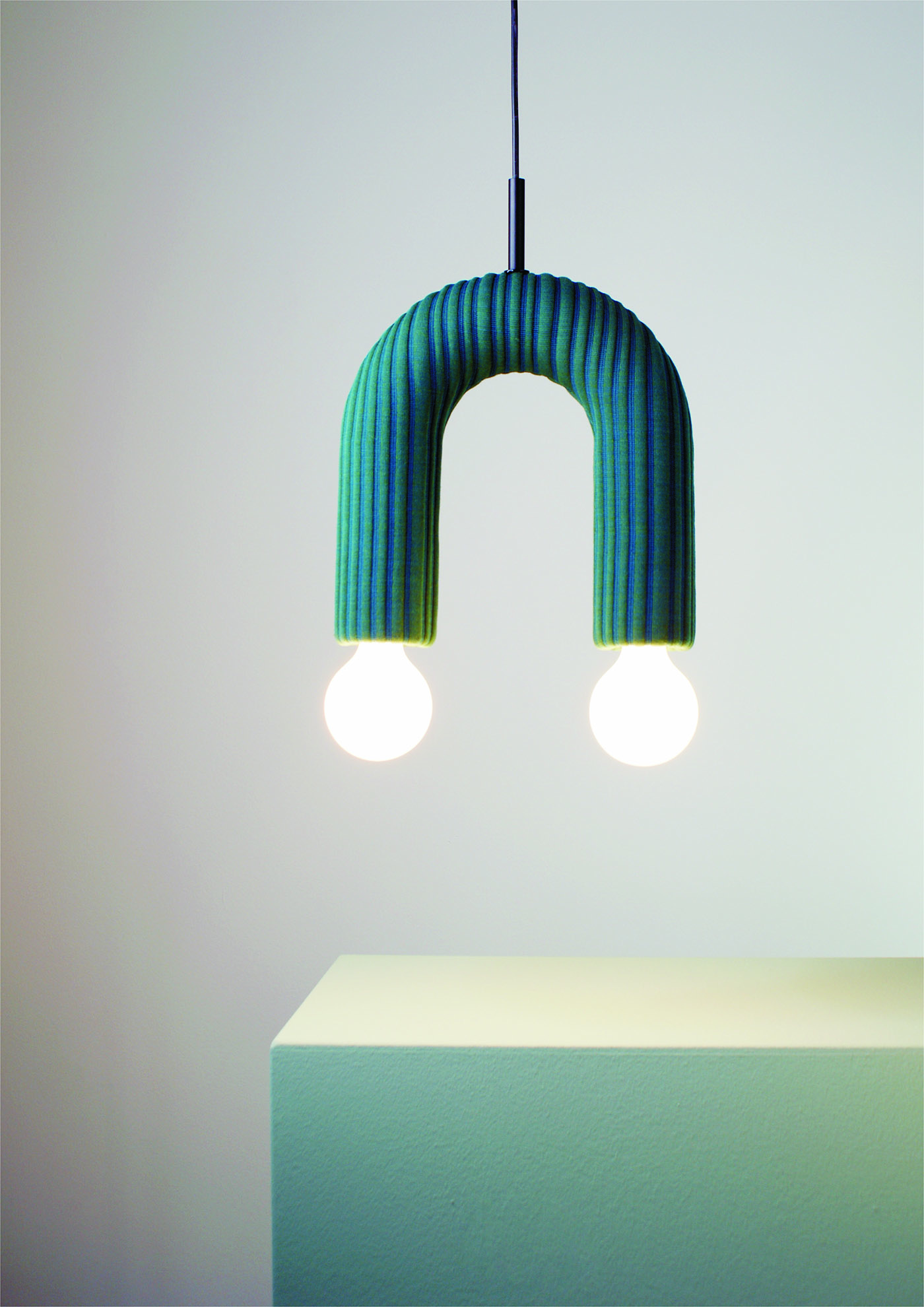 Light which reveals ordinary things. Contemporary handmade fabric lighting