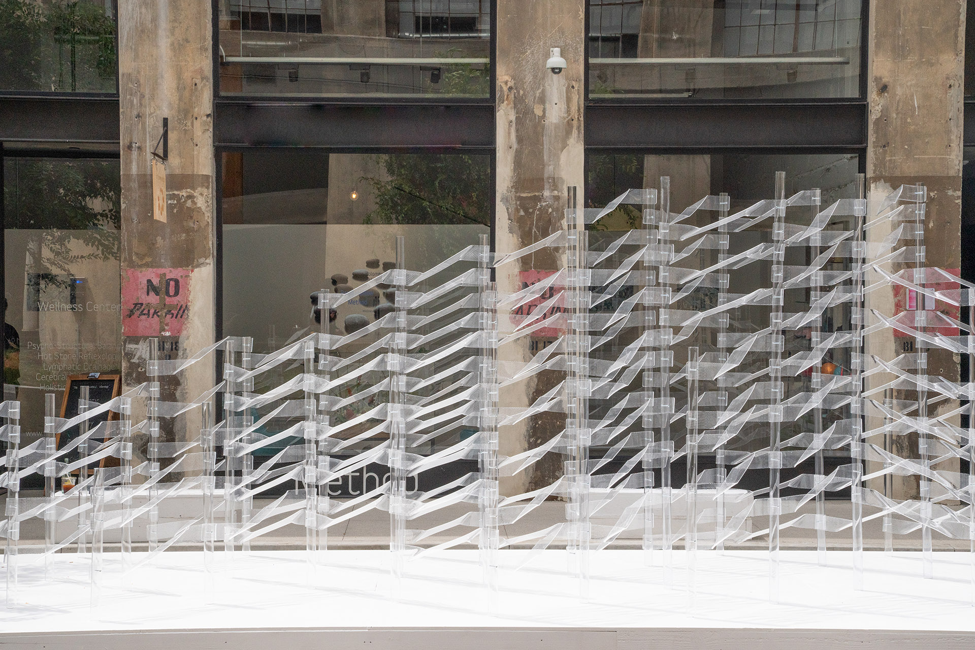 An installation which invites passersby to play with its transparent features