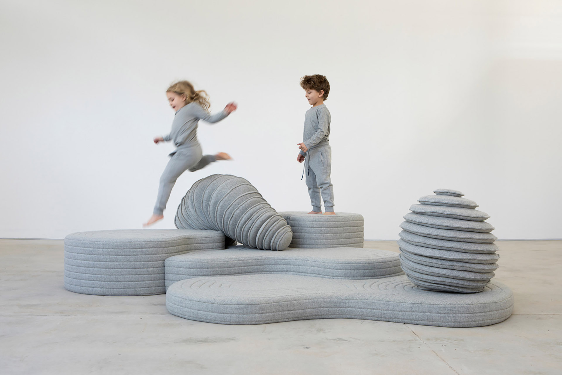Installation by Sarit Shani Hay. A playful landscape inhabited by soft creatures