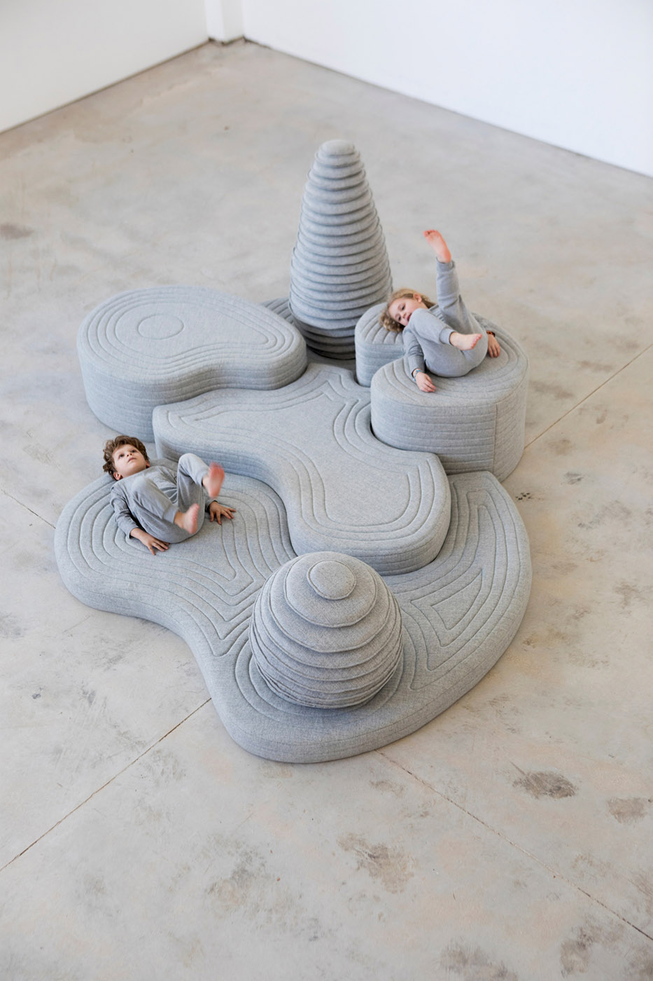 Installation by Sarit Shani Hay. A playful landscape inhabited by soft creatures