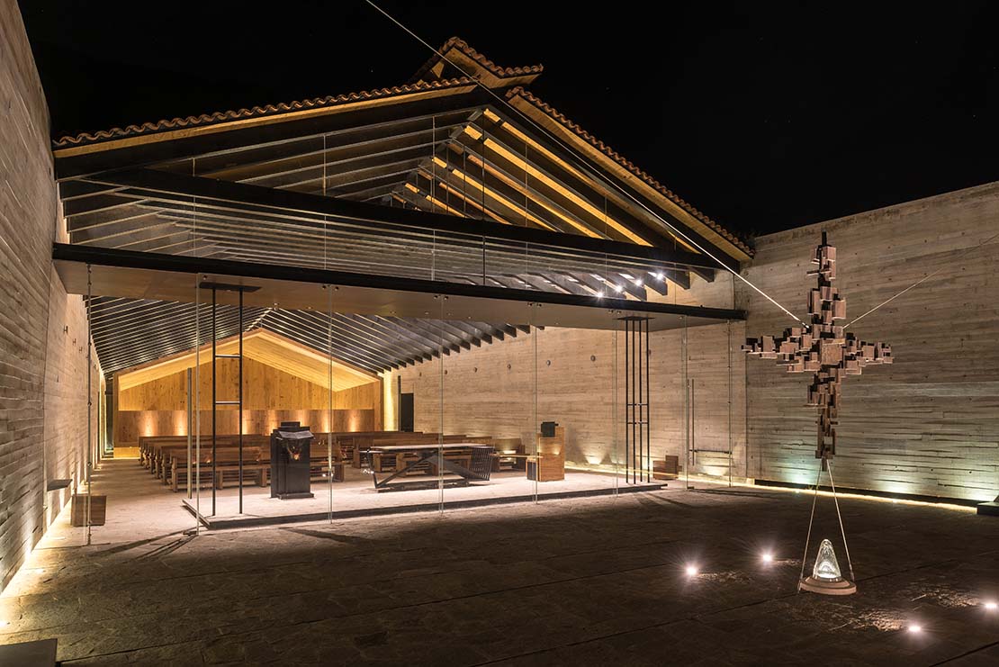 RLJ Chapel. Exposed Concrete and Steel Contrasting with Natural Materials