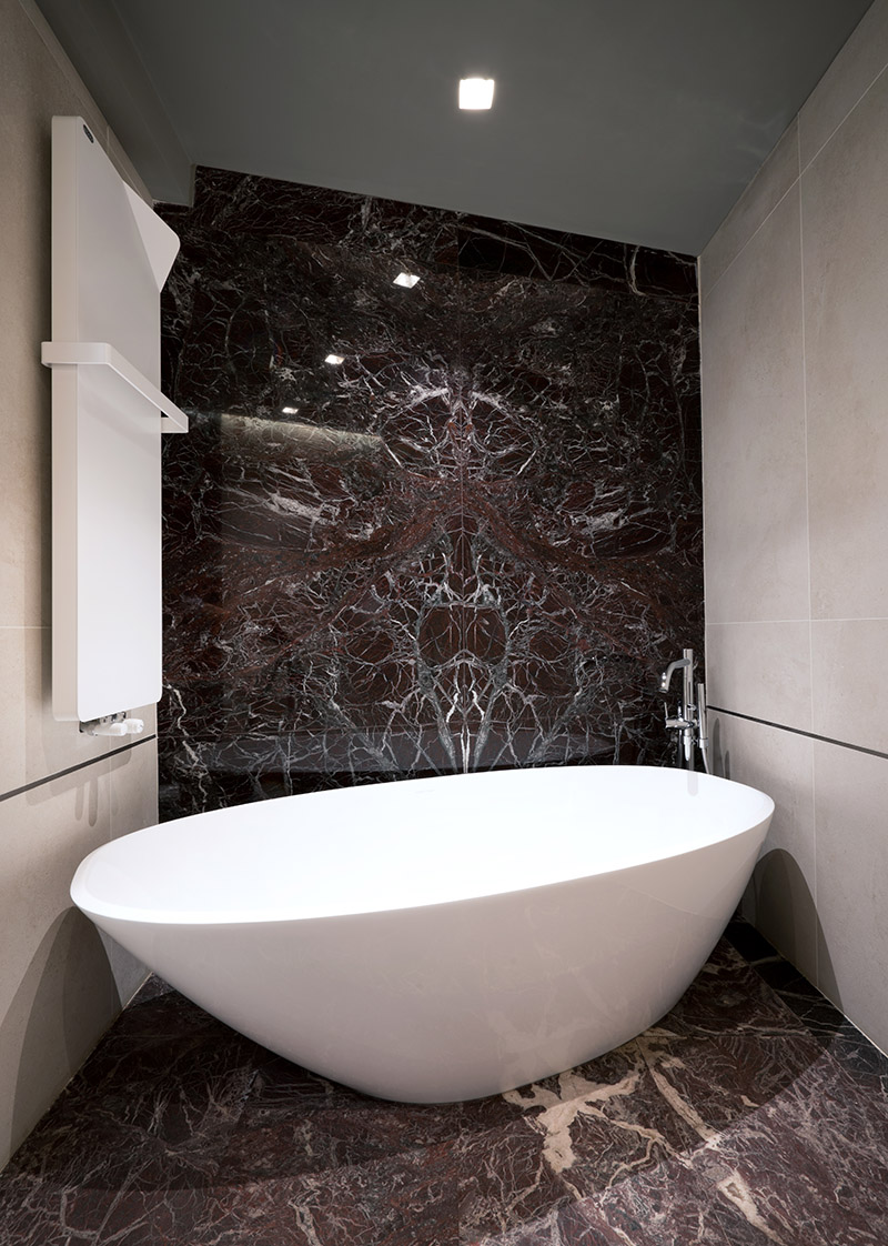 bathroom with full glass tub