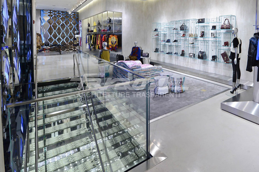 The glass balustrade with the chromed steel structure