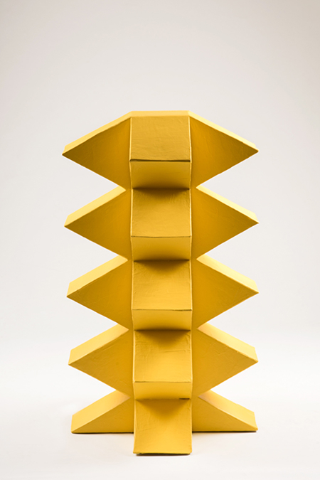 A yellow display with geometric shapes