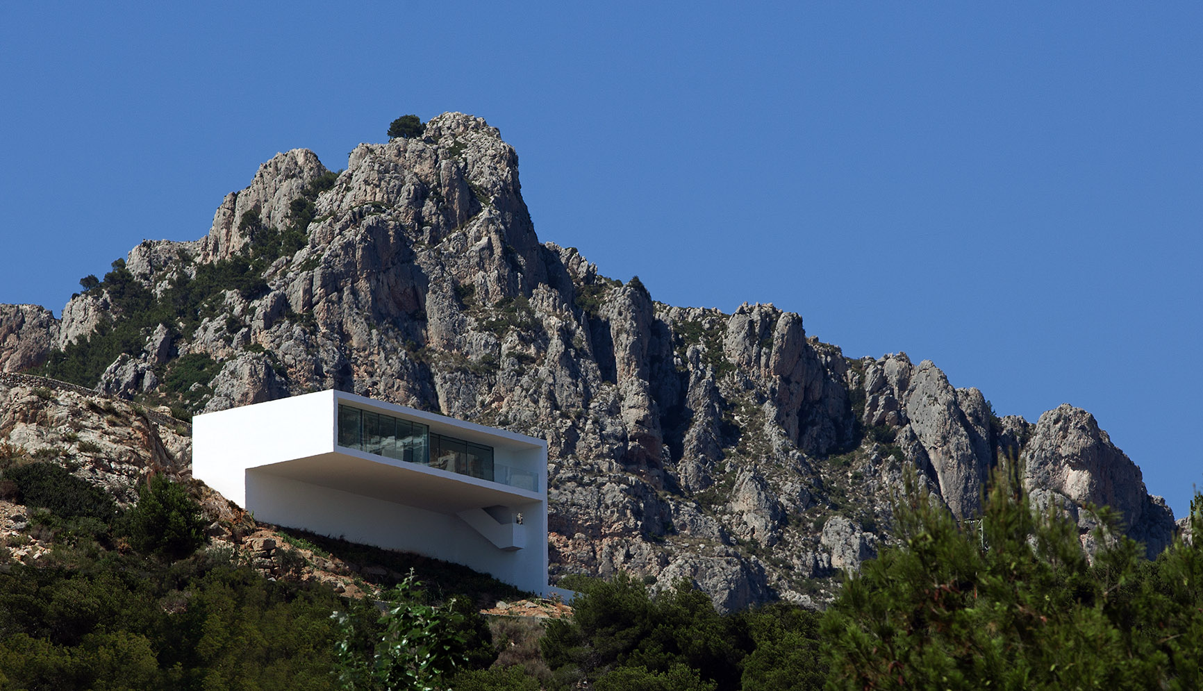 White villa among the rocks