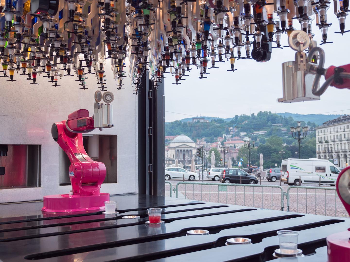 Robot barman colored bottles