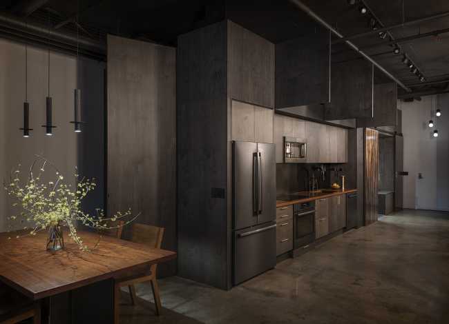 Transformation of a commercial space in Seattle. Photography studio with a sleeping area