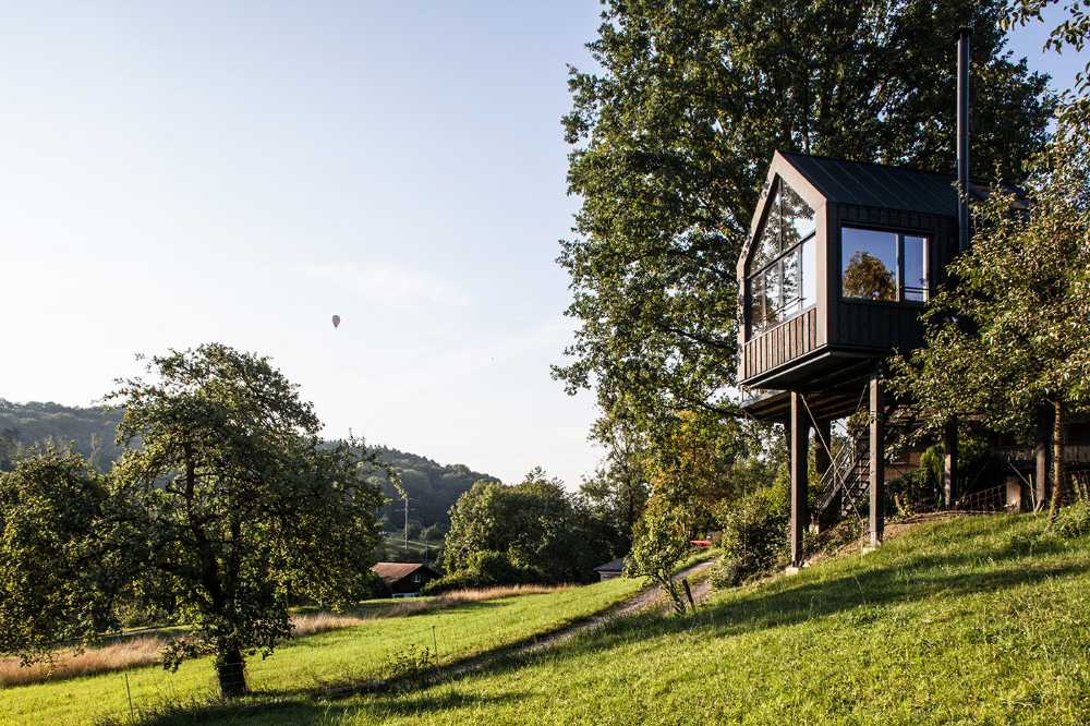 Tree house in Switzerland. A comfortable environment among the leaves of the trees