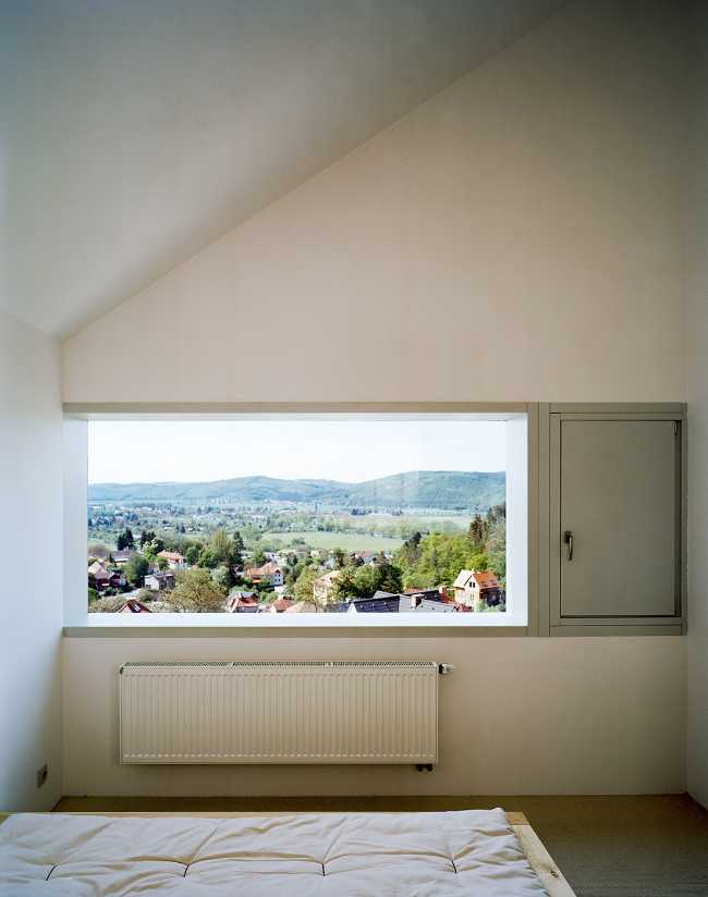 Summer villa outside Prague. Larch cladding for a solidly shaped wooden house