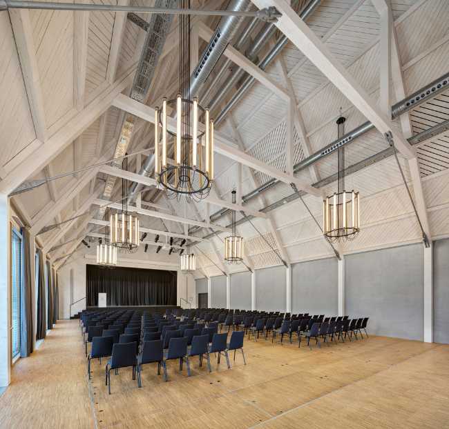 Cultural center in the German city of Berching. Form reinterprets traditional barns