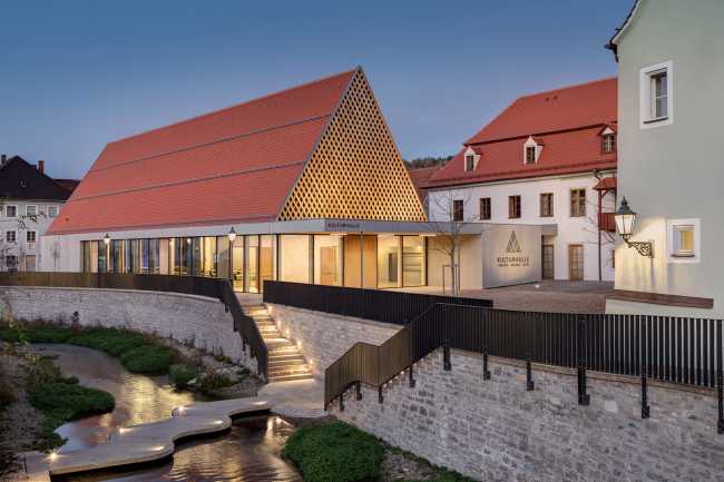 Cultural center in the German city of Berching. Form reinterprets traditional barns