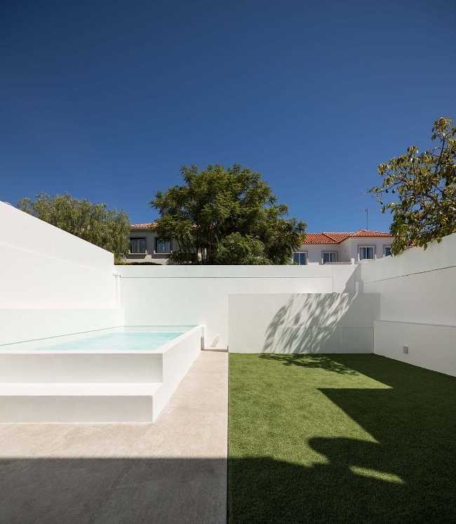 Casa en Lisboa. Ampliación, recualificación y optimización de la morfología del techo