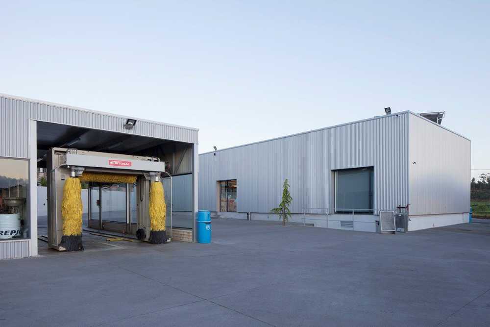 Refurbished petrol station. Corrugated sheet metal for the new cladding