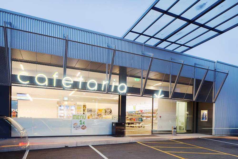 Refurbished petrol station. Corrugated sheet metal for the new cladding