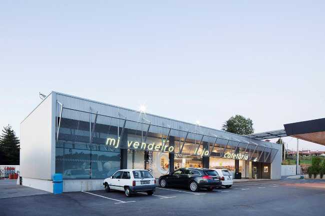 Refurbished petrol station. Corrugated sheet metal for the new cladding