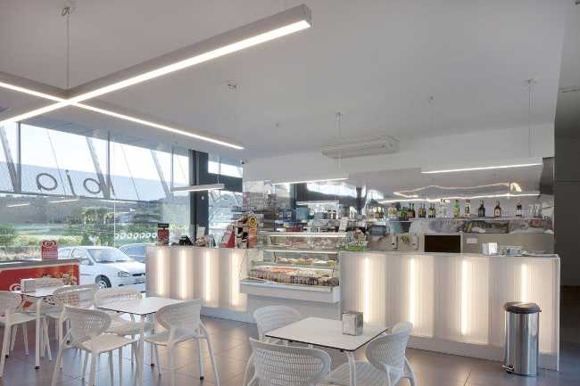 Refurbished petrol station. Corrugated sheet metal for the new cladding