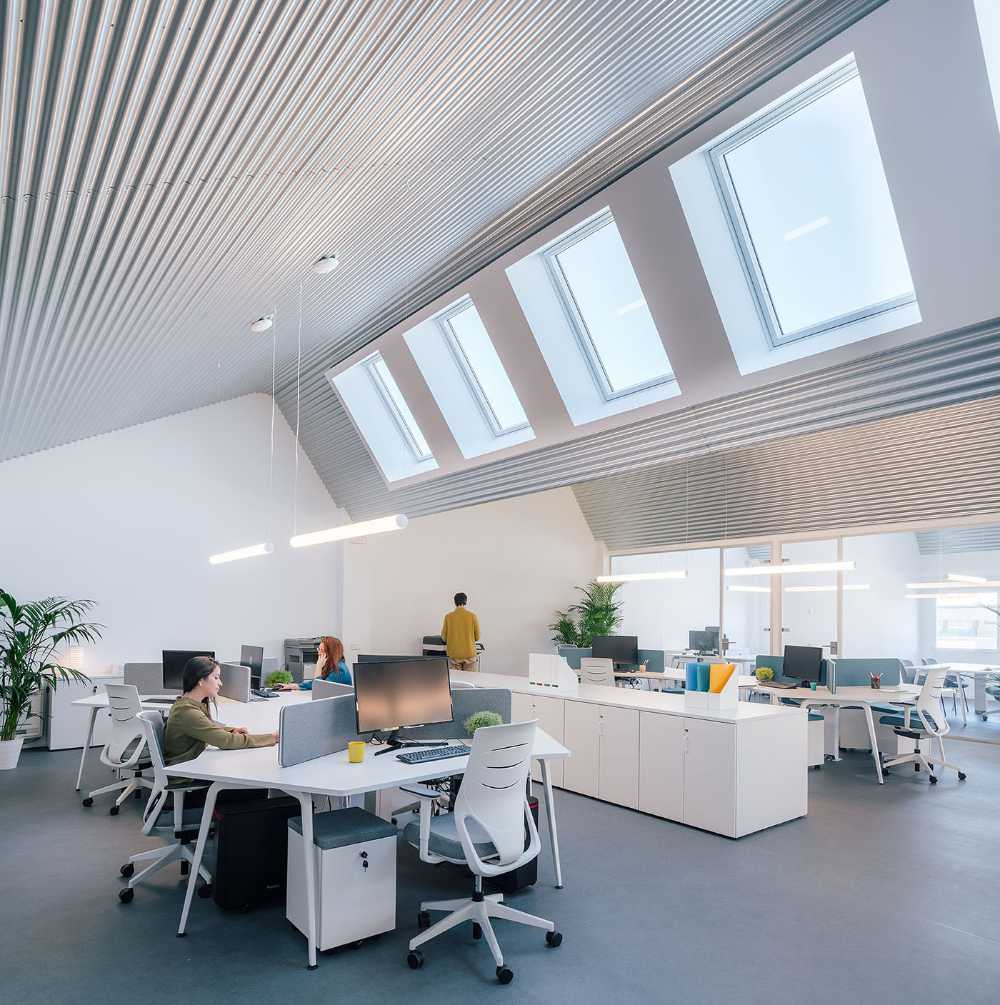Renovated late 20th century industrial warehouse. Office and warehouse for an advertising company