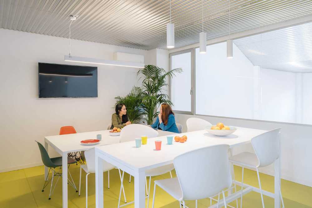 Renovated late 20th century industrial warehouse. Office and warehouse for an advertising company