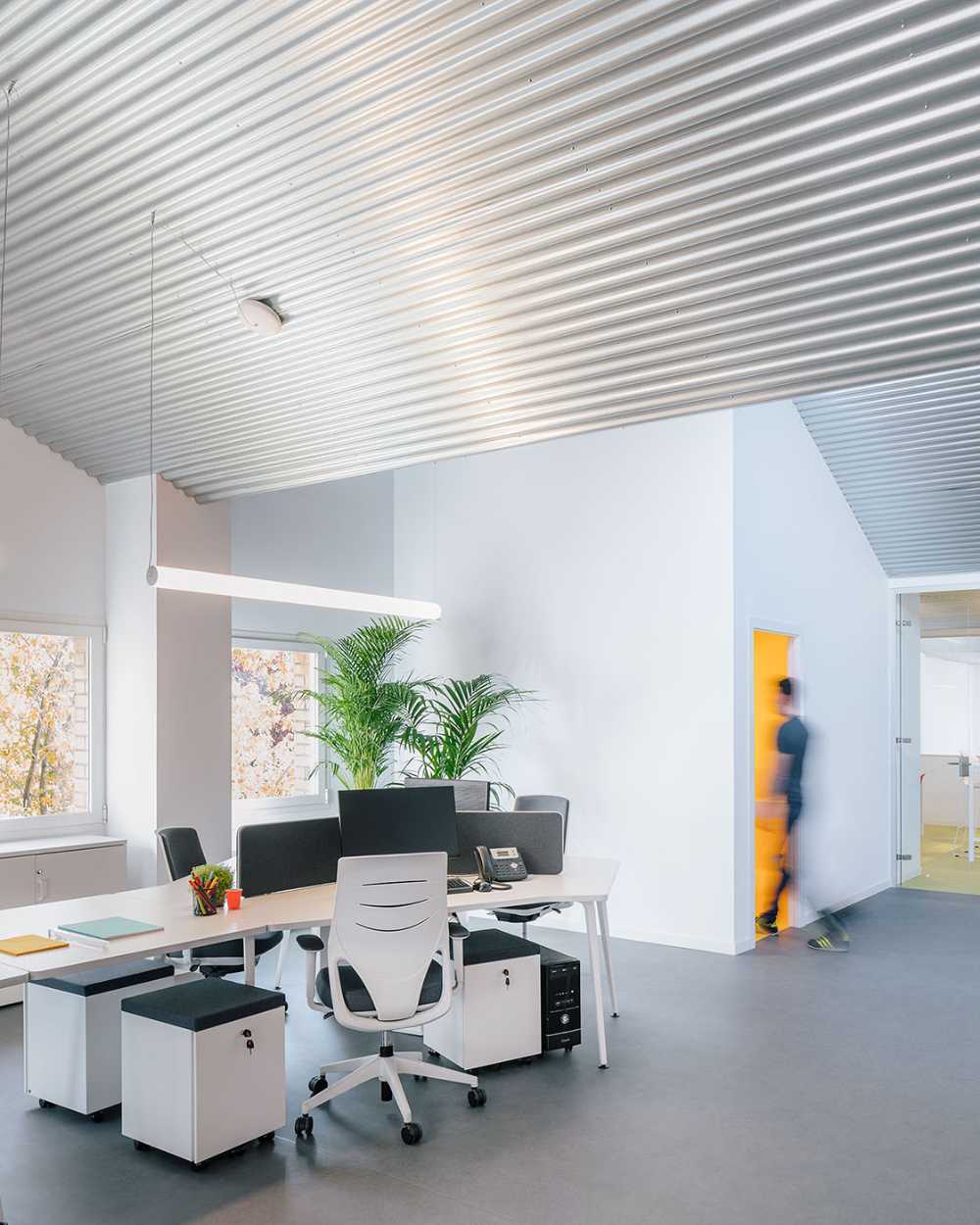 Renovated late 20th century industrial warehouse. Office and warehouse for an advertising company