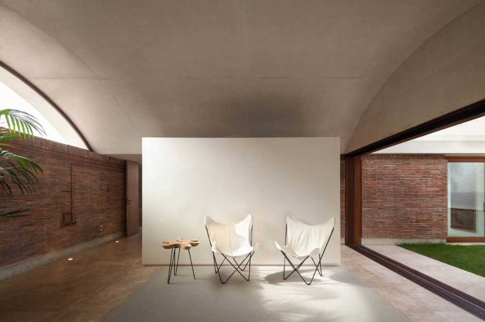 House renovation IV, exposed brick walls and vaulted roof