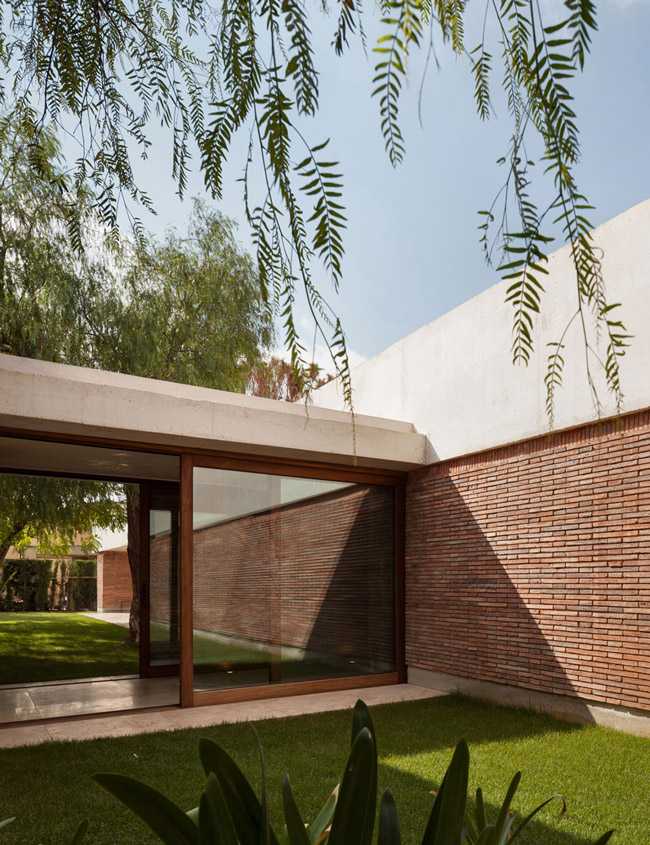 House Renovation IV, exposed brick walls and vaulted roof