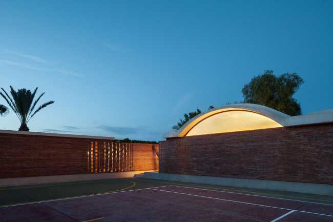 House Renovation IV, exposed brick walls and vaulted roof
