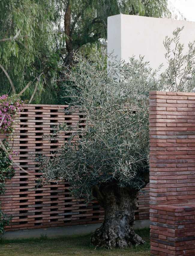 House Renovation IV, exposed brick walls and vaulted roof