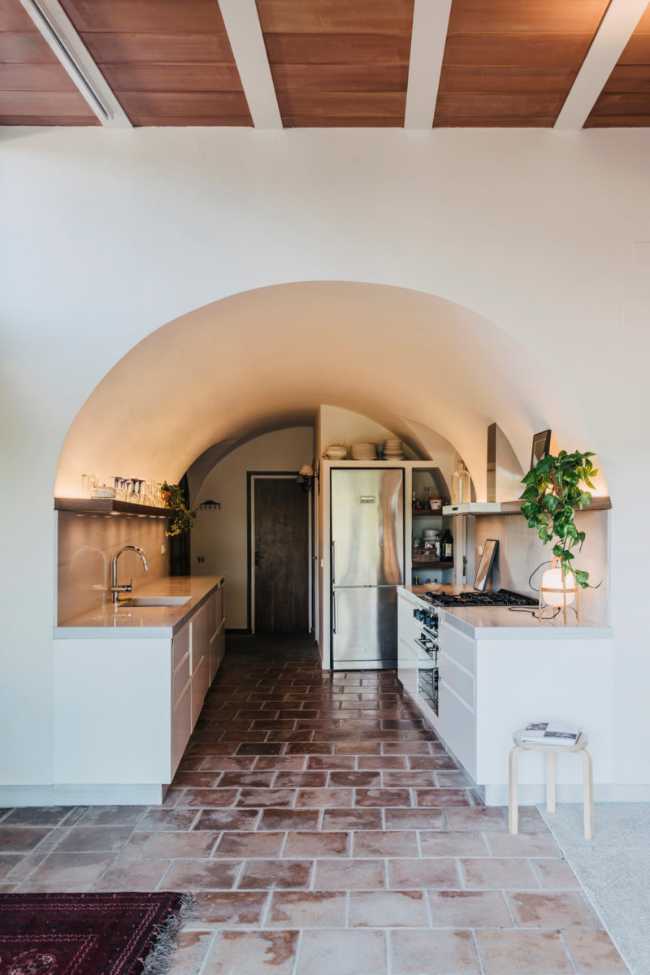 House Renovation IV, exposed brick walls and vaulted roof
