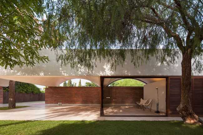 House Renovation IV, exposed brick walls and vaulted roof