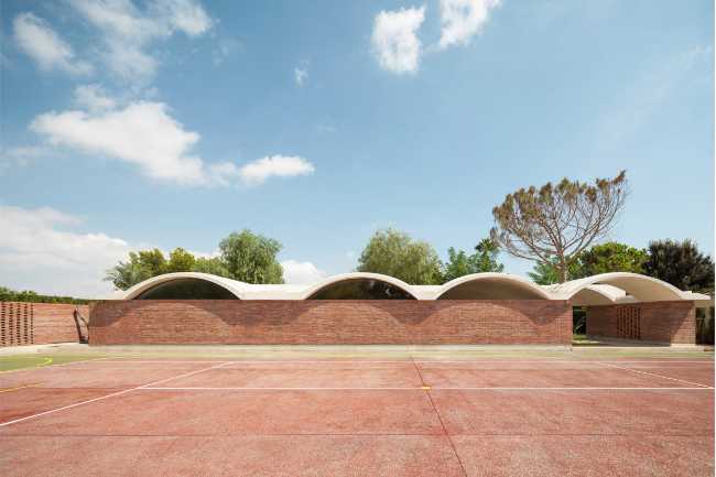 House Renovation IV, exposed brick walls and vaulted roof
