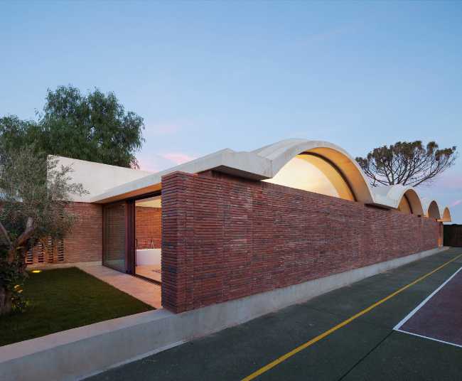 House Renovation IV, exposed brick walls and vaulted roof