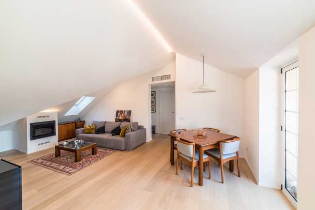 Attic transformed into living space. White and natural light to expand the rooms