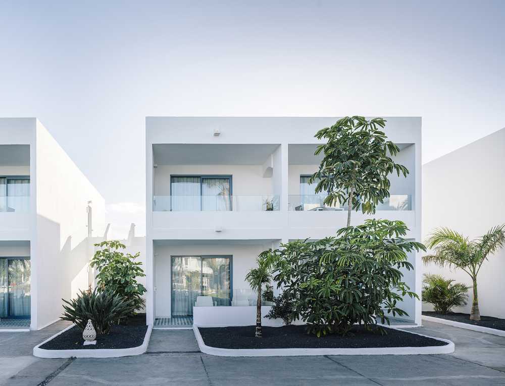 Delicate moodboard with splashes of blue. A small village styled hotel complex in Lanzarote