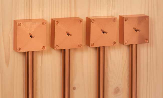 Minimal design for a wooden house. Harmony between the larch wood exterior and the landscape