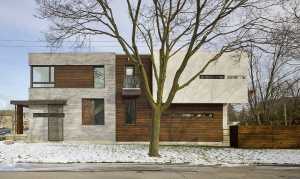 Casa moderna coniuga design e funzionalità. Linee semplici unite a materiali naturali e raffinati