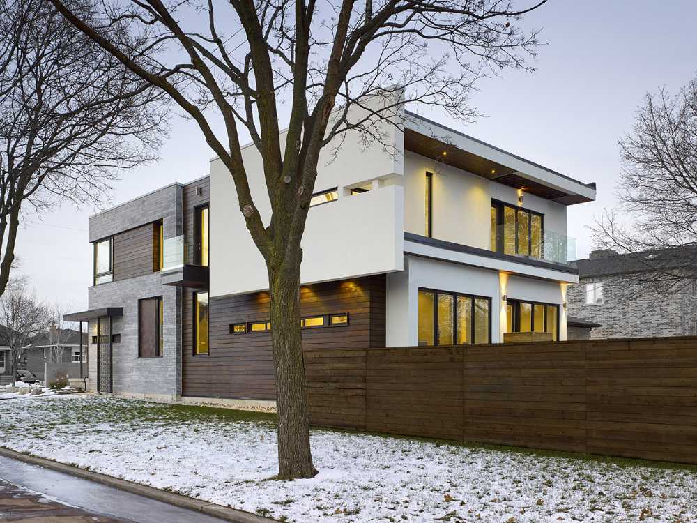 Casa moderna coniuga design e funzionalità. Linee semplici unite a materiali naturali e raffinati