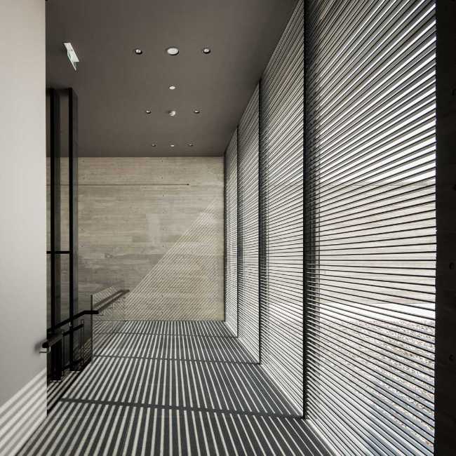 Art museum dedicated to the artist Mu Xin. An intersection of architectural volumes made of reinforced concrete