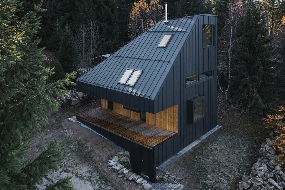 Chalet in montagna dalla forma aerodinamica