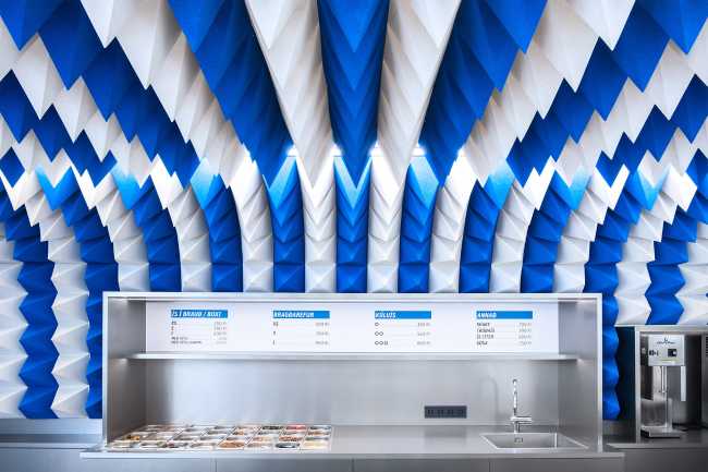 Games of geometries and colors. Ice cream parlor in Reykjavík inspired by an abstract ice cave.
