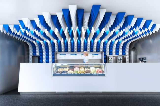 Games of geometries and colors. Ice cream parlor in Reykjavík inspired by an abstract ice cave.