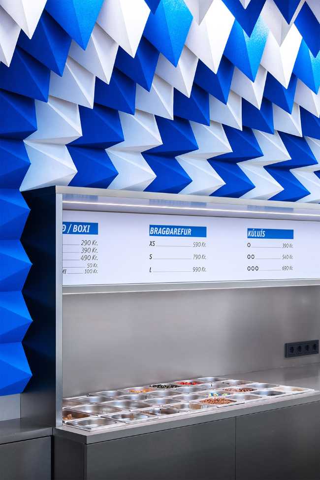 Games of geometries and colors. Ice cream parlor in Reykjavík inspired by an abstract ice cave.