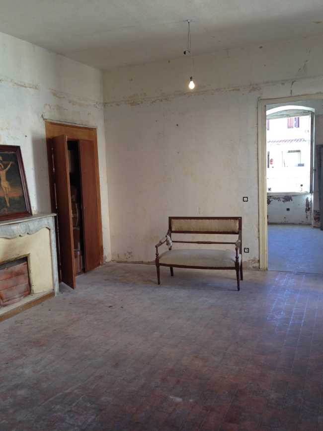 Renovated apartment in Corsica. Wooden floor and local marble fireplaces