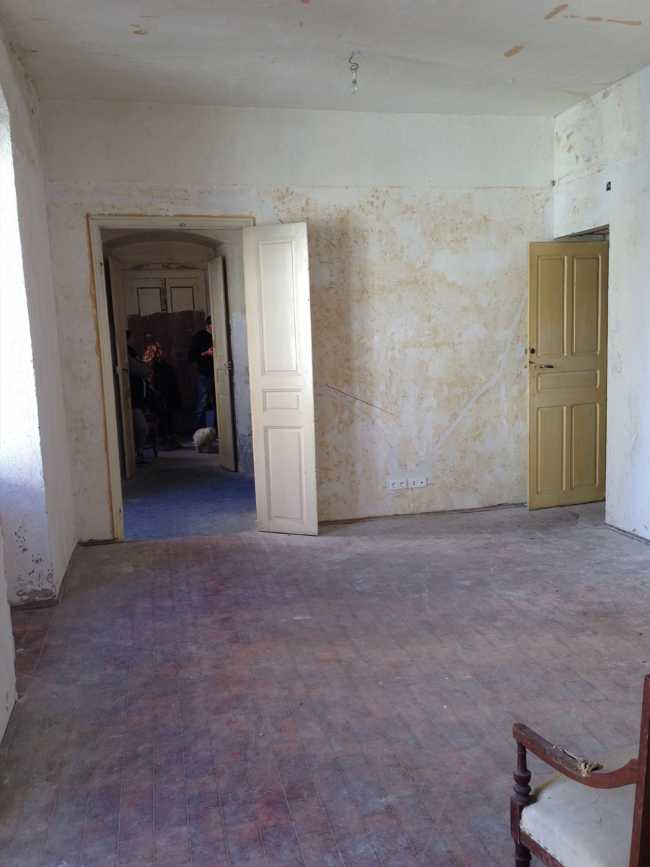 Renovated apartment in Corsica. Wooden floor and local marble fireplaces