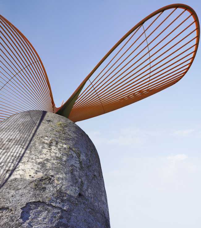 Tra i vulcani di Lanzarote, un mulino-turbina eolica unione di poesia e tecnologia