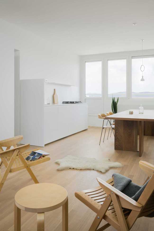 Renovation of an apartment in Ljubljana. An economical project with simple and open spaces