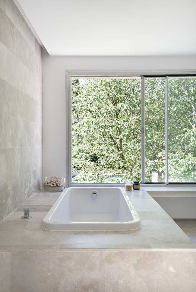 Casa a L:architettura contemporanea per una casa anni 60